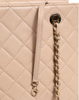 Chanel Quilted Leather Lock Flap Handbag - Beige