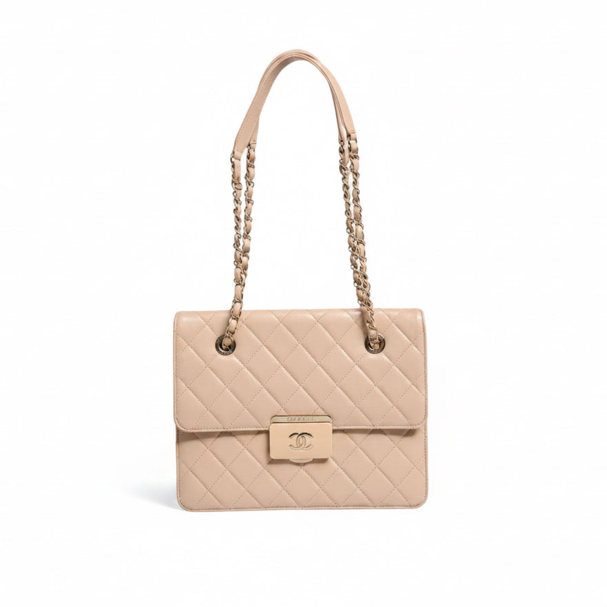 Chanel Quilted Leather Lock Flap Handbag - Beige
