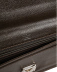 Louis Vuitton Belaia Travel Clutch - Dark Brown