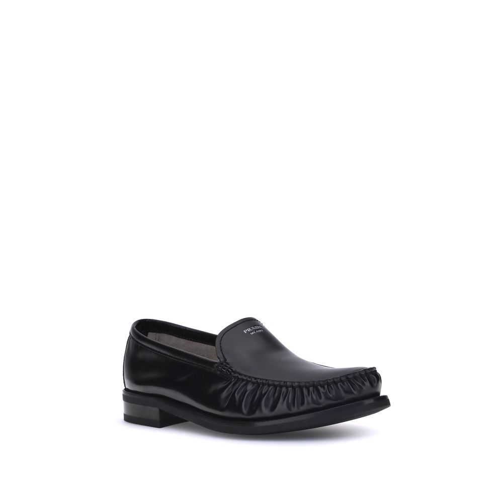 all black brushed leather loafers