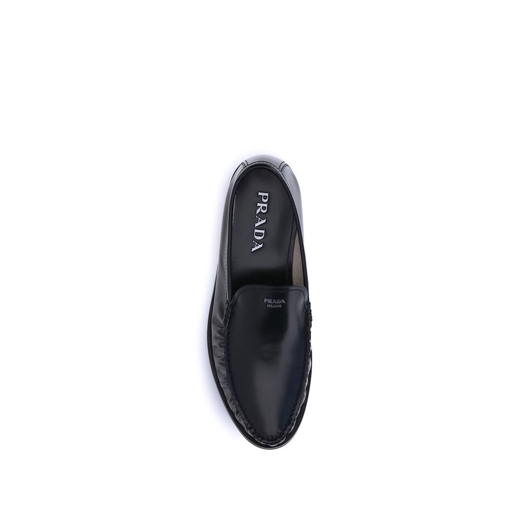 all black brushed leather loafers